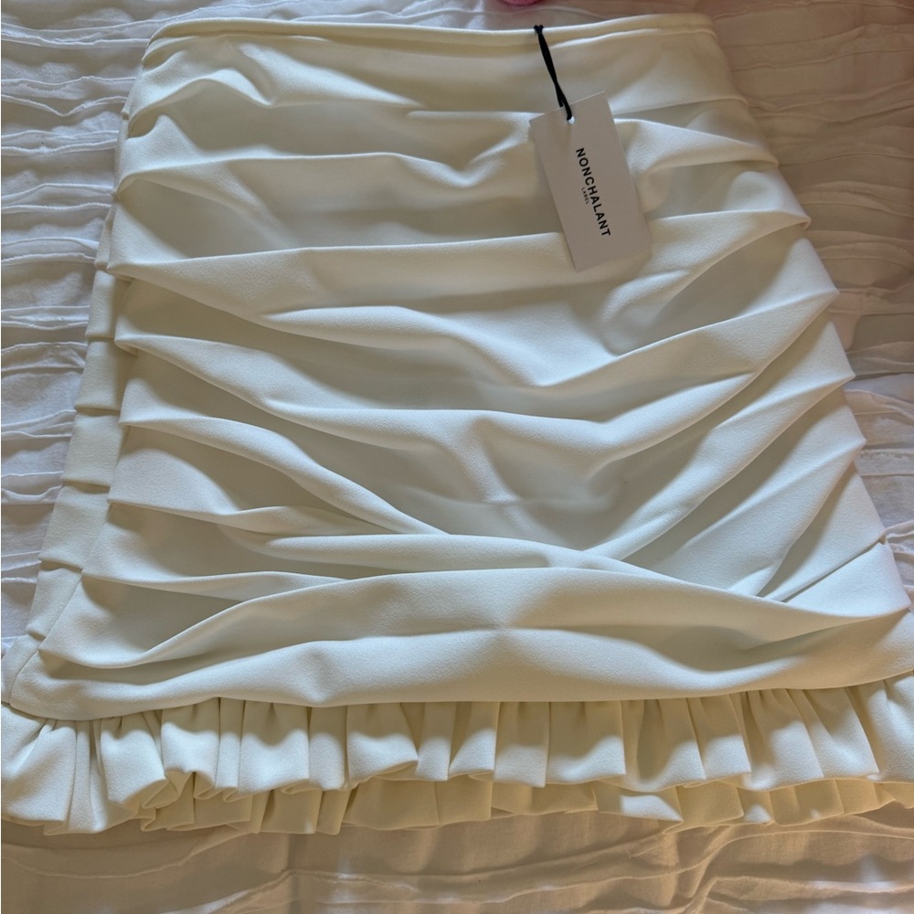 NWT nonchalant white mini skirt